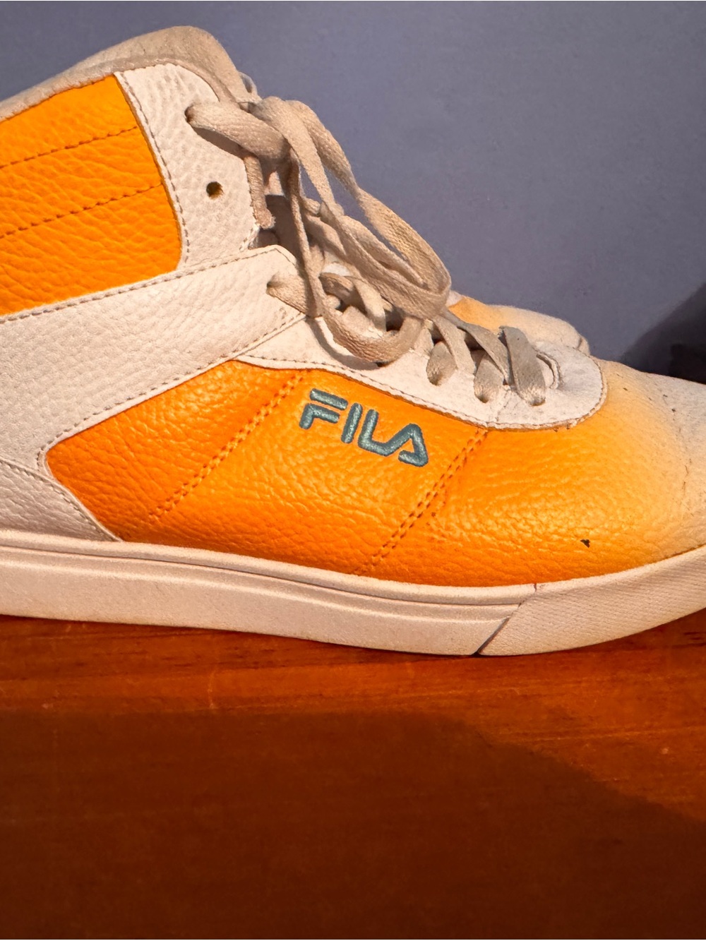 Fila Adult size 9.5 High-Top Sneakers in Orange and White